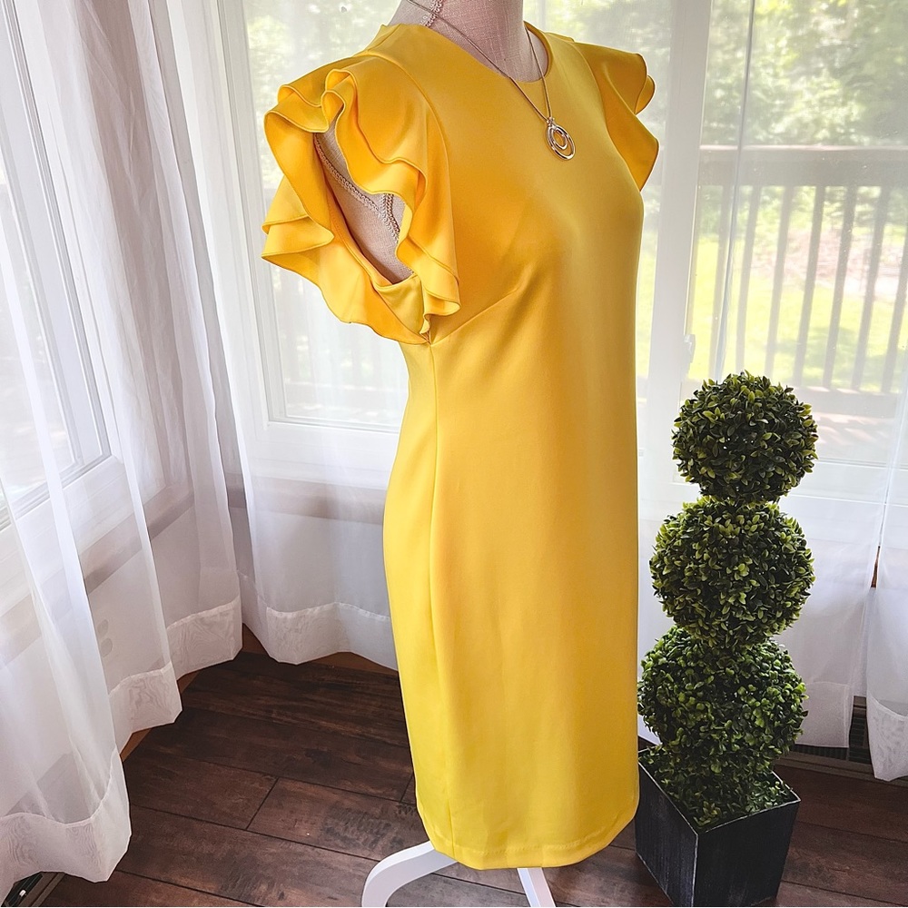 Tommy Hilfiger Scuba Crew Neck Flutter Ruffle Cap Sleeve Dress
Yellow Size 8 NWT - Picture 13 of 16